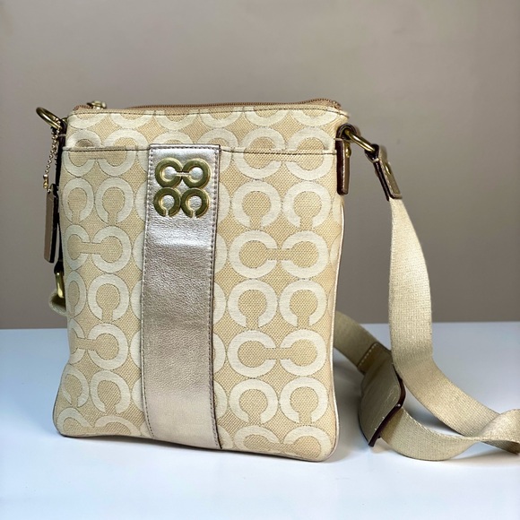 Coach Gold Metallic Signature Optic Art Swingpack Crossbody Bag 45536 - Picture 1 of 10